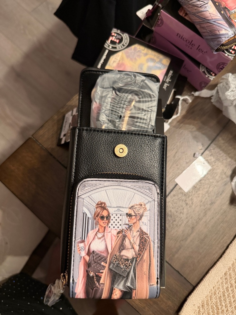 Nicole Lee Black Crossbody Phone Bag with Pink Fashion Illustration